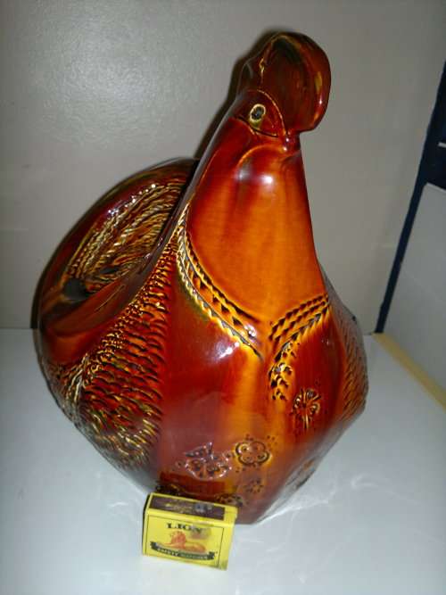 A Door stop or a display item a Large and Heavy pottery glazed Brown Hen.