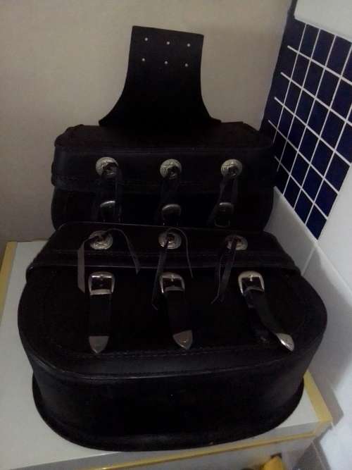 Two Genuine LEATHER Motorcycle side panniers/saddlebags. Still in a good used condition.