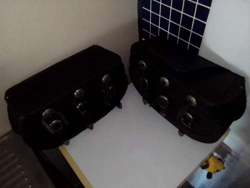 Two Genuine LEATHER Motorcycle side panniers/saddlebags. Still in a good used condition.