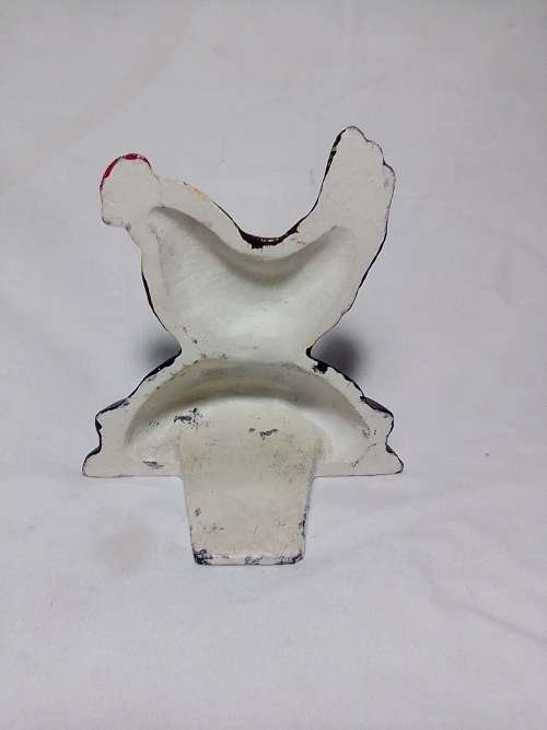 A Cast Iron Door Stop with a Rooster motif in clean condition.Size:110mm T x 100mm L Good order.