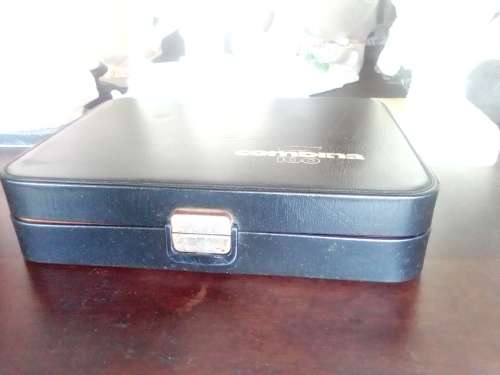 A vintage ` Combina` dual purpose Razor/Massager in original carry case with instructions.
