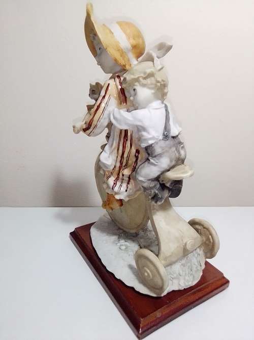 WoW. A Vintage F.E.J. Collector`s Edition Porcelain. A Girl with small Boy, Cat on a Tricycle.