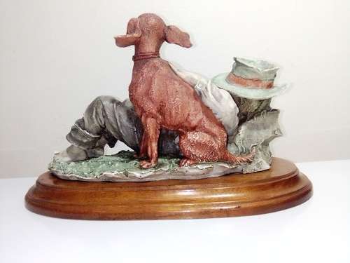 Vintage Capodimonte Signed by Guiseppe Armani ITALY 1982 sleeping Boy with a dog on a wooden stand.