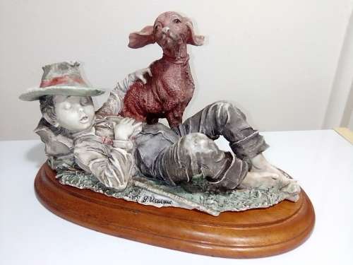 Vintage Capodimonte Signed by Guiseppe Armani ITALY 1982 sleeping Boy with a dog on a wooden stand.