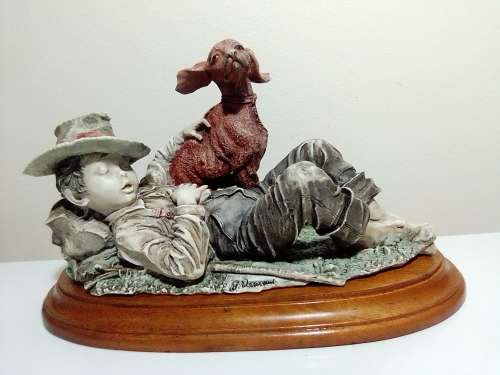 Vintage Capodimonte Signed by Guiseppe Armani ITALY 1982 sleeping Boy with a dog on a wooden stand.