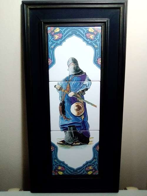 A rare `Man of War` 3 tile plaque from Algeria mounted in a Old solid wooden frame.