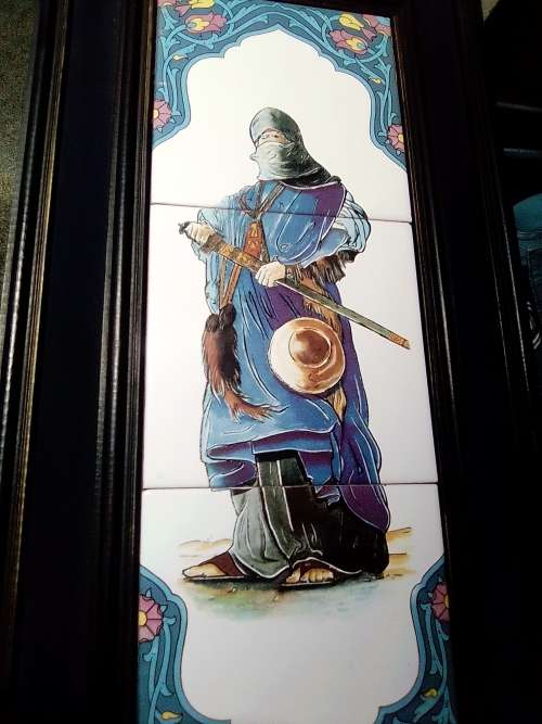 A rare `Man of War` 3 tile plaque from Algeria mounted in a Old solid wooden frame.
