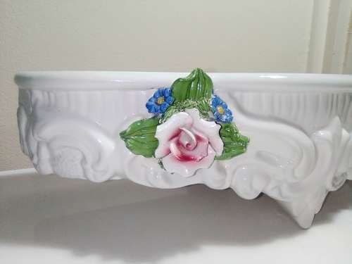 Out of a 1900`s Victorian House in Durban North this awesome old porcelain wall shelf.