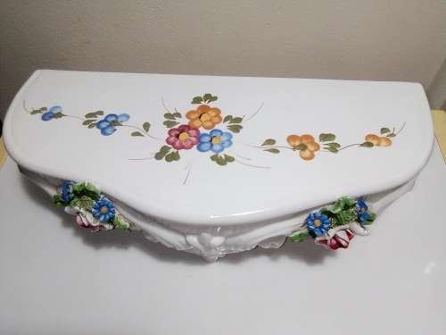 Out of a 1900`s Victorian House in Durban North this awesome old porcelain wall shelf.