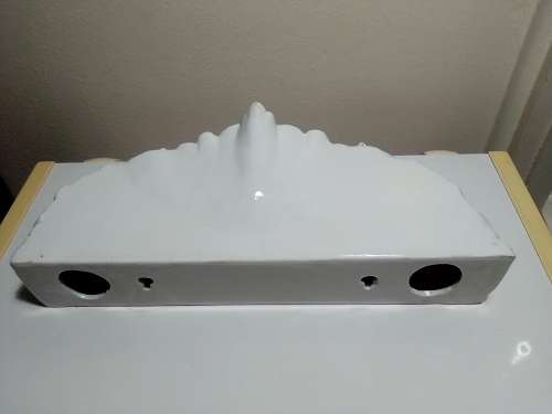 Out of a 1900`s Victorian House in Durban North this awesome old porcelain wall shelf.