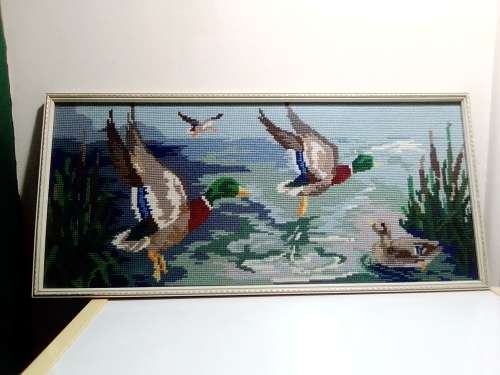 A Collectors Wall Hanging Embroidered Mallard Ducks flying framed picture.