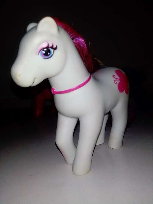 3 x My Little Ponys 2 Dark Pink and a White Butterfly pony`s Stamped `Simba-Toys.