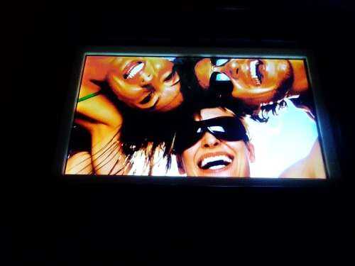 A `Coby` 7 ` Digital photo frame plug in and play with Instructions and Charger in box.