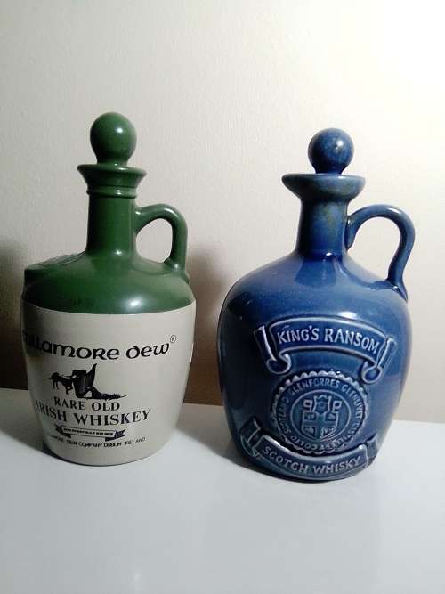 3 items. Bells Scotch 8year (Wade) and Tullamore Dew and King`s Ransom Irish Whiskey empty bottle`s