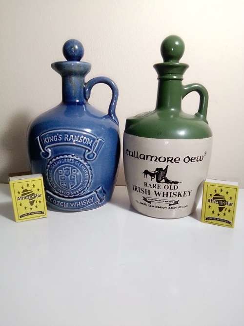 3 items. Bells Scotch 8year (Wade) and Tullamore Dew and King`s Ransom Irish Whiskey empty bottle`s
