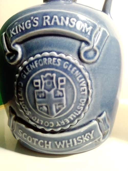 3 items. Bells Scotch 8year (Wade) and Tullamore Dew and King`s Ransom Irish Whiskey empty bottle`s