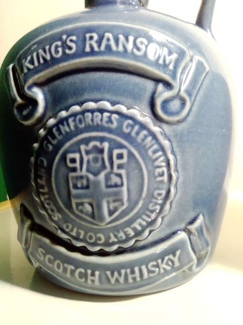 3 items. Bells Scotch 8year (Wade) and Tullamore Dew and King`s Ransom Irish Whiskey empty bottle`s