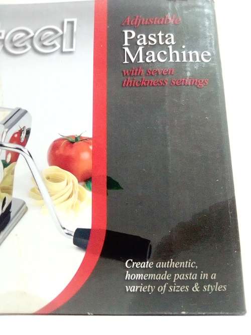 A boxed TUFFSTEEL Adjustable Pasta Machine complete with bracket and drive handle.