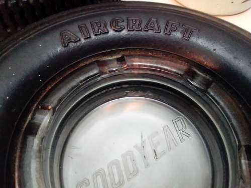 2 Tyre Ashtrays. A 1940`s Goodyear Aircraft Ashtray + a Rhodesia 1960`s Firestone Advanx ashtray.