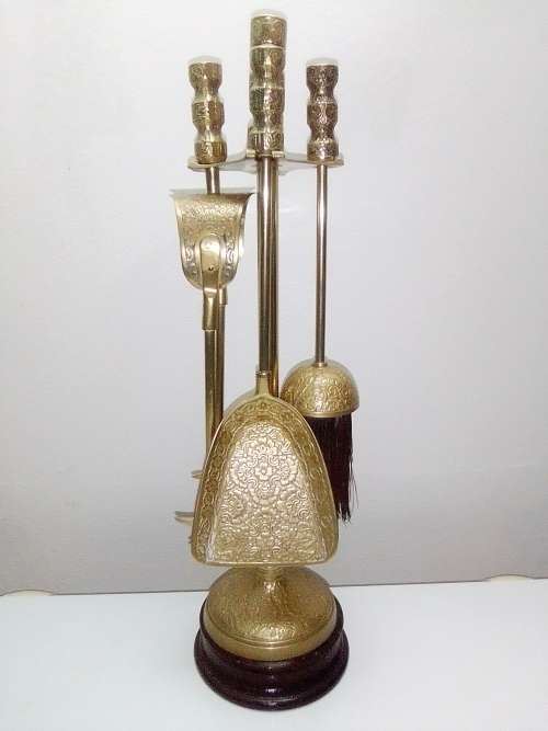 Ideal for that Rustick Fire place. Ornate & Heavy Solid Brass Fire Irons complete on matching stand.
