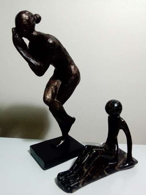 `RESERVED FOR MOMACO 1981`. Two abstract Figurines. Cold cast Bronze+ a heavy Granite female forms