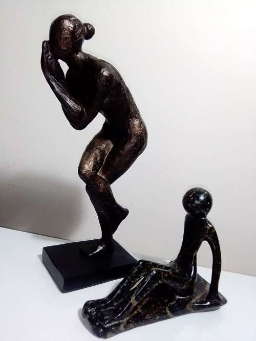 `RESERVED FOR MOMACO 1981`. Two abstract Figurines. Cold cast Bronze+ a heavy Granite female forms