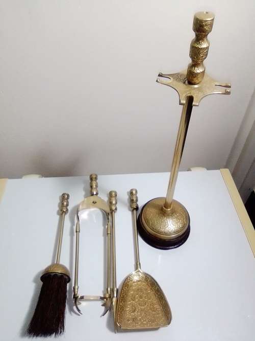 Ideal for that Rustick Fire place. Ornate & Heavy Solid Brass Fire Irons complete on matching stand.