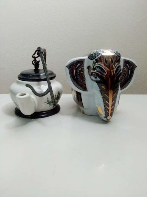Porcelain/Pewter Kettle/Oil lamp. A True Shi Lankin Memento Elephant 1 sealed pack. The Art of Tea.