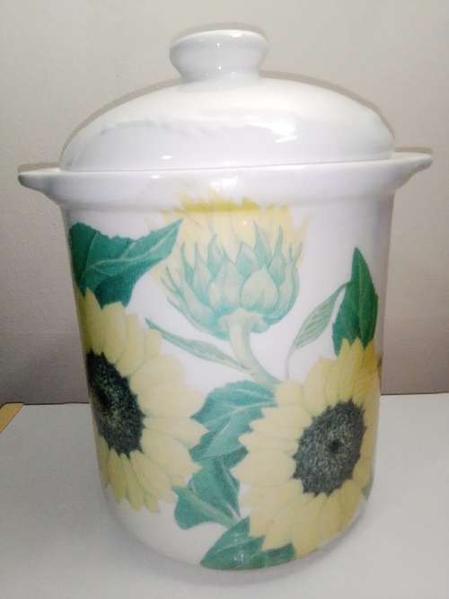 A large ceramic `Bread Crock` bin.