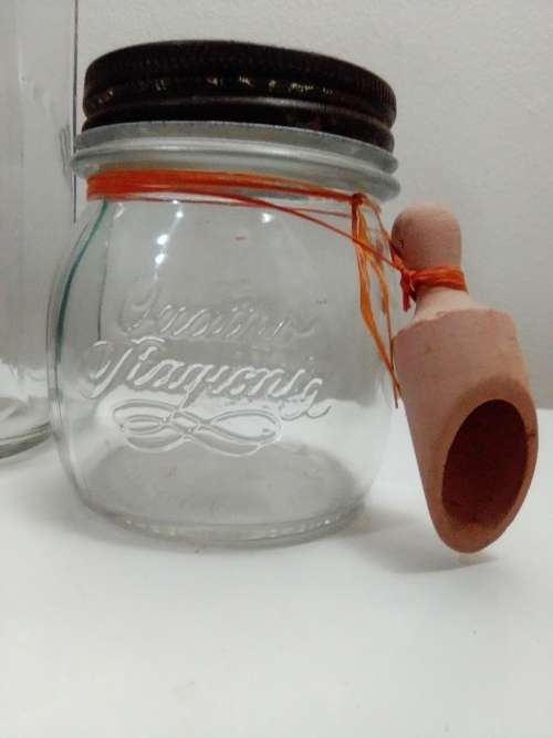 2 Unusual glass storage bottle`s, a Bormioli Rocco with spoon and a Swing Top Glass Bottle