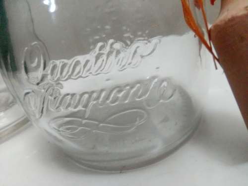 2 Unusual glass storage bottle`s, a Bormioli Rocco with spoon and a Swing Top Glass Bottle
