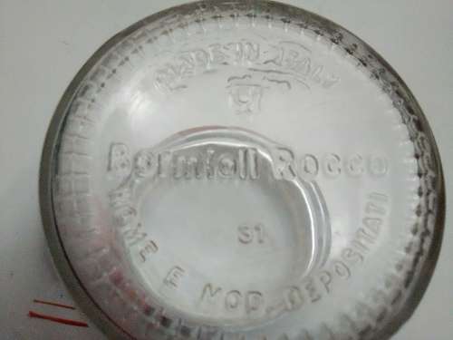 2 Unusual glass storage bottle`s, a Bormioli Rocco with spoon and a Swing Top Glass Bottle