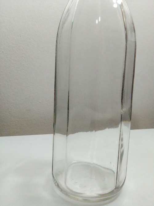 2 Unusual glass storage bottle`s, a Bormioli Rocco with spoon and a Swing Top Glass Bottle
