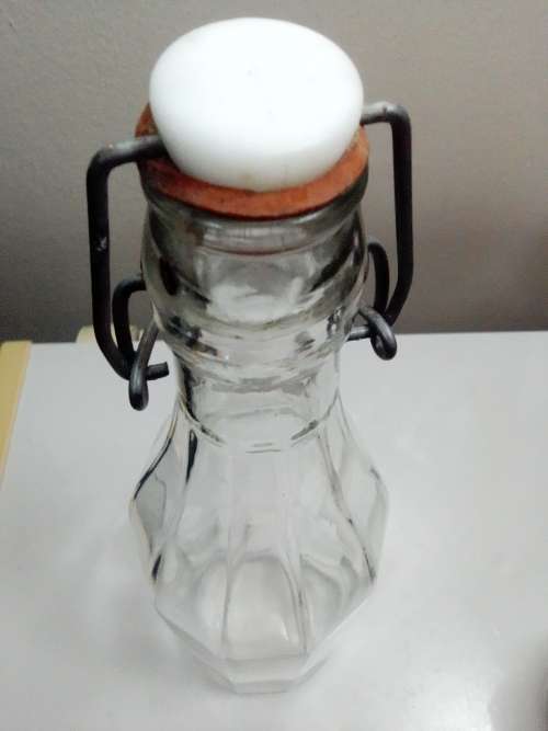 2 Unusual glass storage bottle`s, a Bormioli Rocco with spoon and a Swing Top Glass Bottle