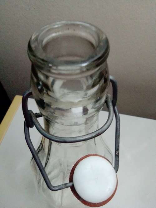 2 Unusual glass storage bottle`s, a Bormioli Rocco with spoon and a Swing Top Glass Bottle
