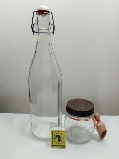 2 Unusual glass storage bottle`s, a Bormioli Rocco with spoon and a Swing Top Glass Bottle