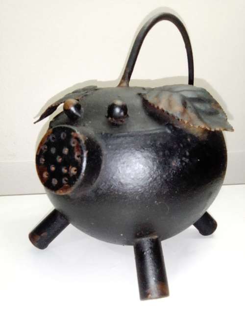 Vintage black steel Potbelly Pig watering can. Whimsical `Hold Your Bacon` Pig Iron watering Can.