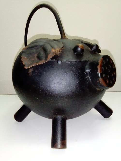Vintage black steel Potbelly Pig watering can. Whimsical `Hold Your Bacon` Pig Iron watering Can.