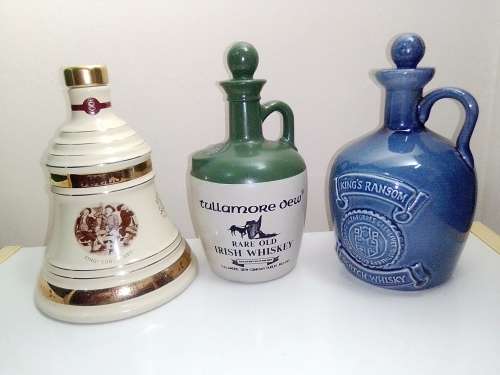 3 items. Bells Scotch 8year (Wade) and Tullamore Dew and King`s Ransom Irish Whiskey empty bottle`s