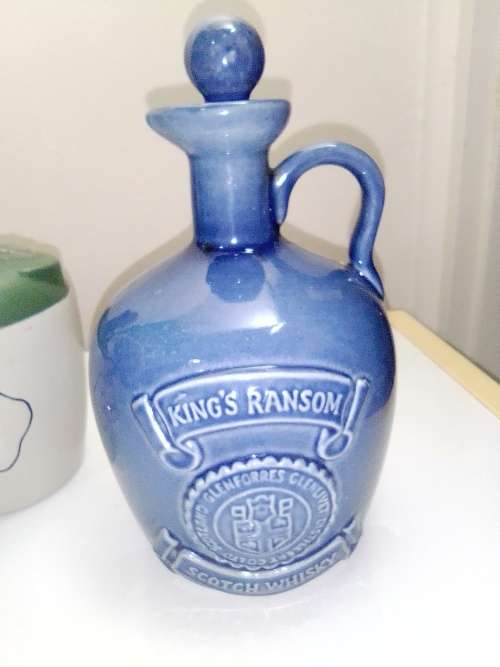 3 items. Bells Scotch 8year (Wade) and Tullamore Dew and King`s Ransom Irish Whiskey empty bottle`s
