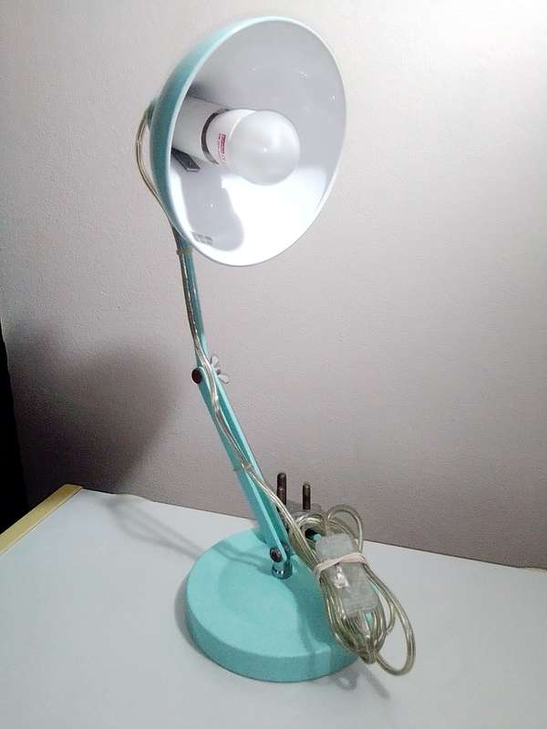 A neet working Desktop Adjustable Lamp to shine on your laptop or workplace.