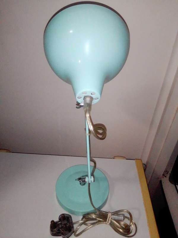 A neet working Desktop Adjustable Lamp to shine on your laptop or workplace.
