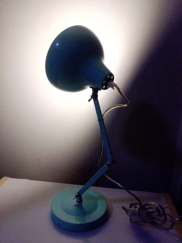 A neet working Desktop Adjustable Lamp to shine on your laptop or workplace.
