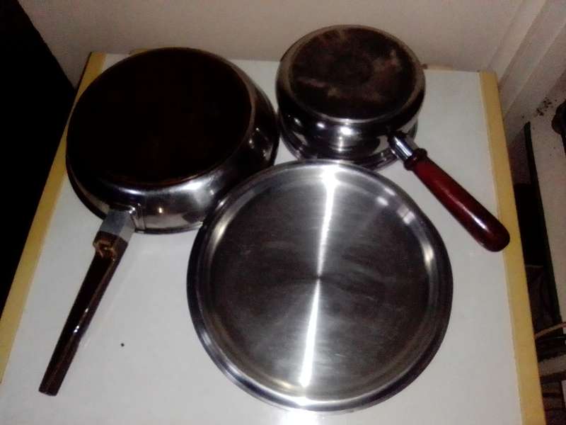 2 cooking pots, A `ALOE` copper based lidded long handled 26cm 18/8 stainless skillet + smaller pot.