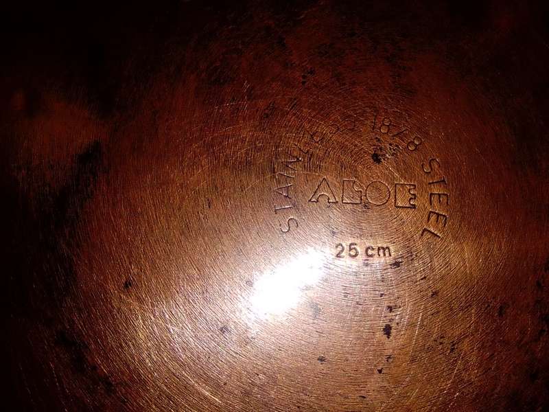 2 cooking pots, A `ALOE` copper based lidded long handled 26cm 18/8 stainless skillet + smaller pot.