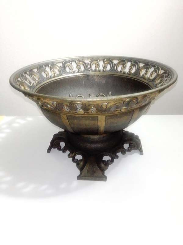 A vintage heavily ornated Bronze Italian Centre piece/fruit bowl on foot with 4 feet.