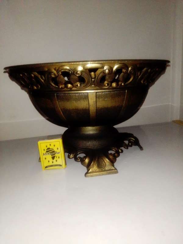A vintage heavily ornated Bronze Italian Centre piece/fruit bowl on foot with 4 feet.
