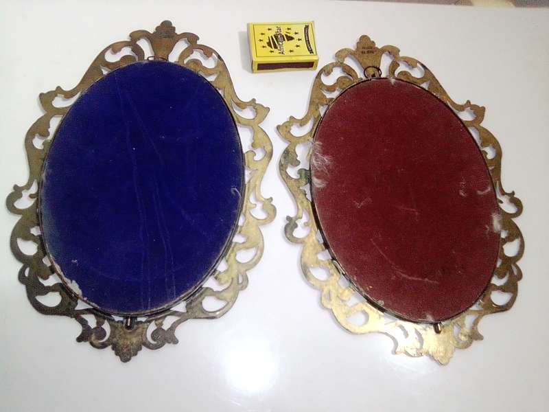 Ornate two photo frames. Both are Brass with Silk litho prints and stamped ITALY.