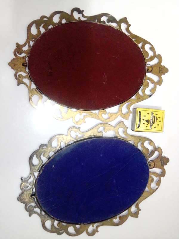 Ornate two photo frames. Both are Brass with Silk litho prints and stamped ITALY.