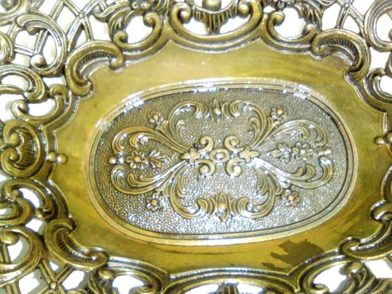 A Vintage Bronze trinket dish with filigree and a stamp ` Mod dep made in Italy `